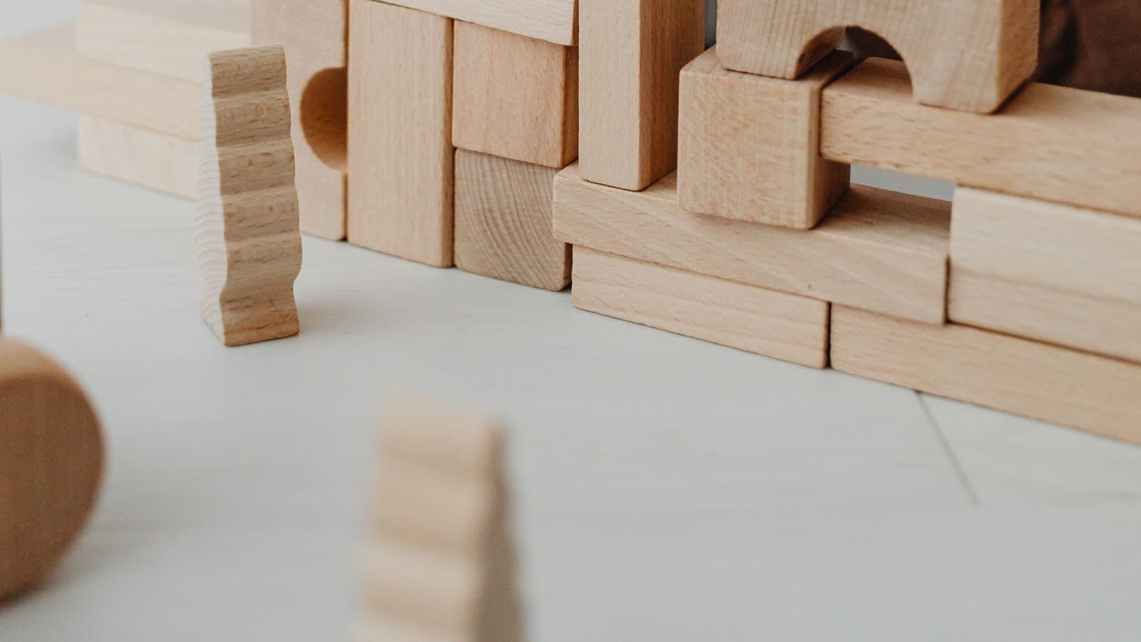 A structure built from natural wooden blocks