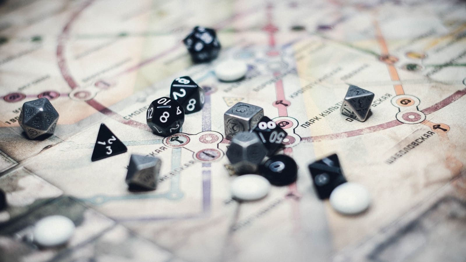 Dice and counters spread across a strategy game map