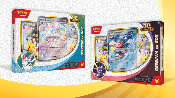 Two Pokémon TCG 30th Celebration ex Boxes side by side: the blue Sylveon ex Box on the left and the red Greninja ex Box on the right, each showing its promo card and booster packs.
